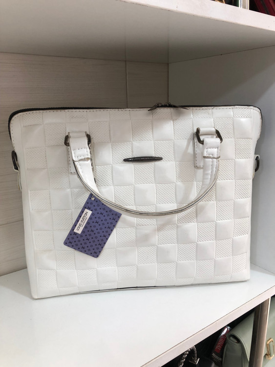 کیف زنانه چرم مدل چهارخونه